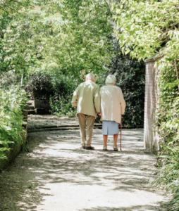 Old Couple Walking in The Park